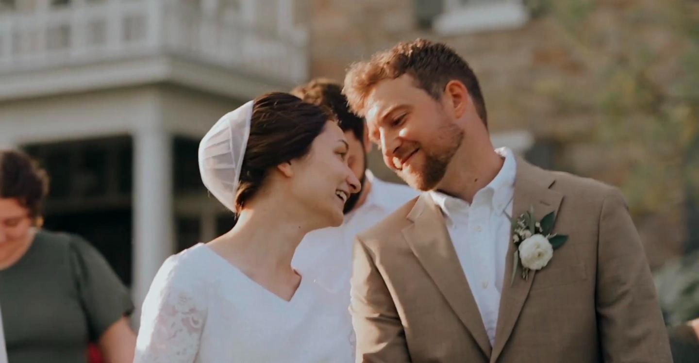 Bride and groom laughing after the ceremony